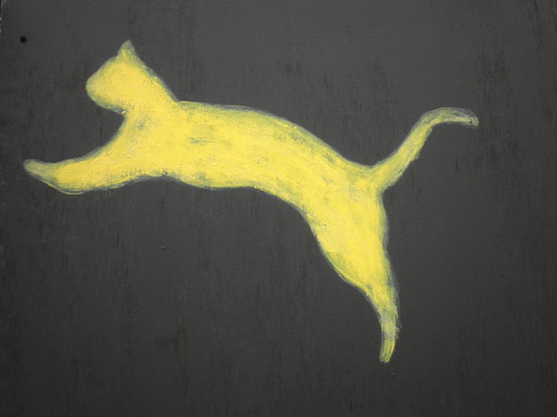 O gato amarelo