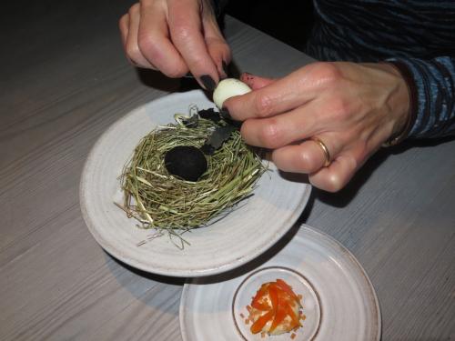 A small egg coated in ash, sauce made from dried trout and pickled marigold A small egg coated in ash, sauce made from dried trout and pickled marigold