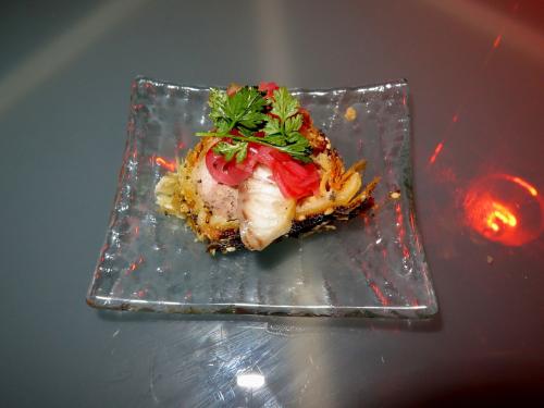 Game sausage roll, smoked eel & apple, pickled radish