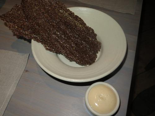 Linseed and vinegar crisps, blue shell mussel dip