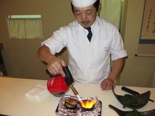Tomoaki Kanazawa e o maçarico Tomoaki Kanazawa e o maçarico