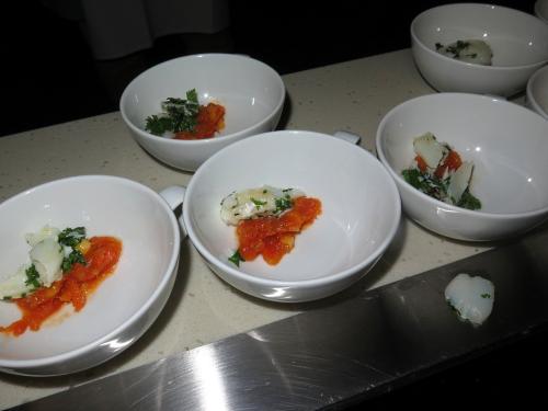 Foie gras with green curry, tomato jam, diced mango, cod petals